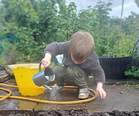 Freddy playing on the garden