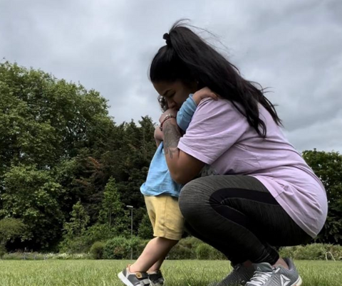 Yashica and Logan hugging