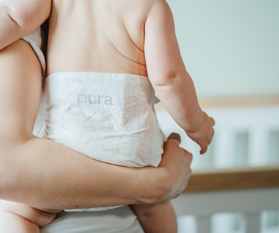 Baby in Pura's skin safe nappies