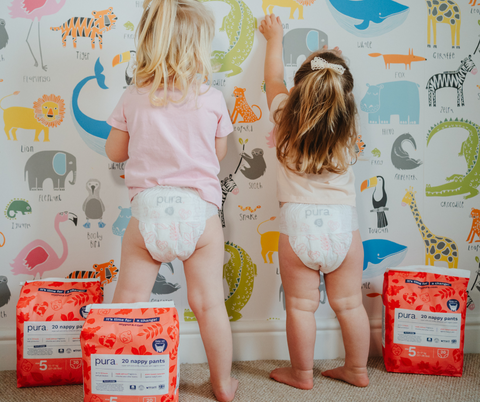 Toddlers wearing Pura nappy pants