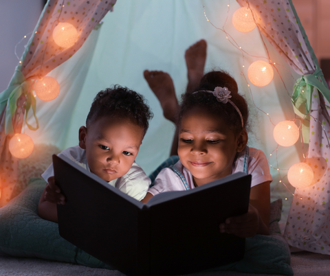 Children reading a bedtime story