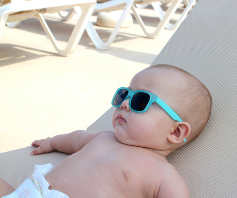 Baby chilling on a sun lounger